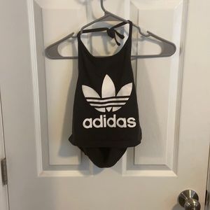 Adidas cropped athletic tank top with open back.
